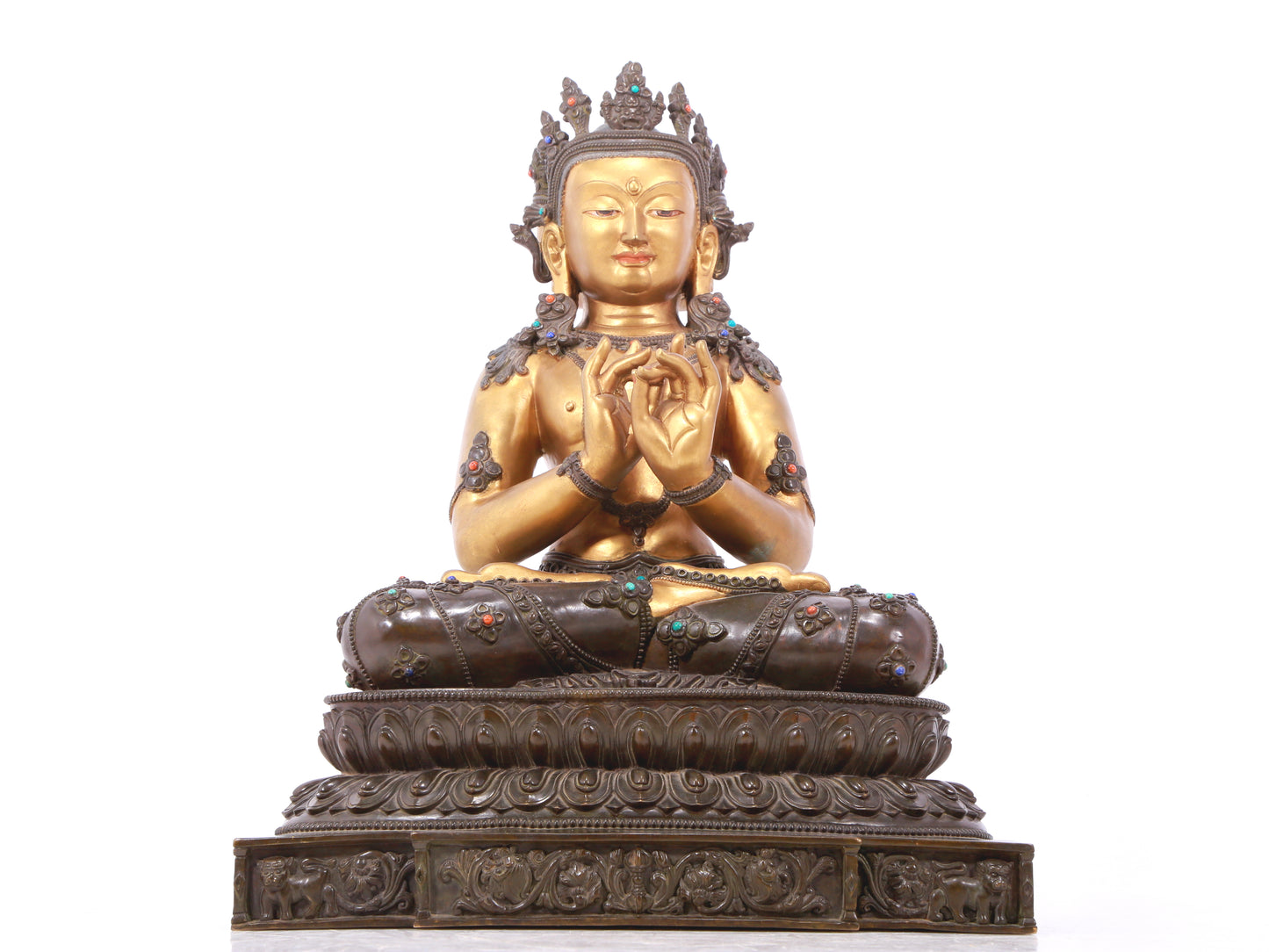 A serene gilt bronze statue of Bodhisattva inlaid with hundreds of treasures