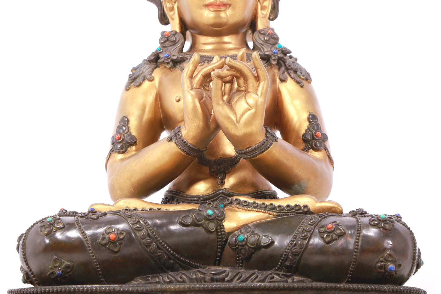 A serene gilt bronze statue of Bodhisattva inlaid with hundreds of treasures