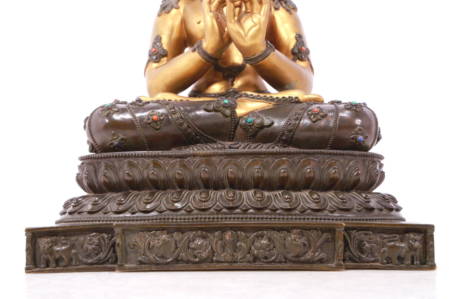 A serene gilt bronze statue of Bodhisattva inlaid with hundreds of treasures