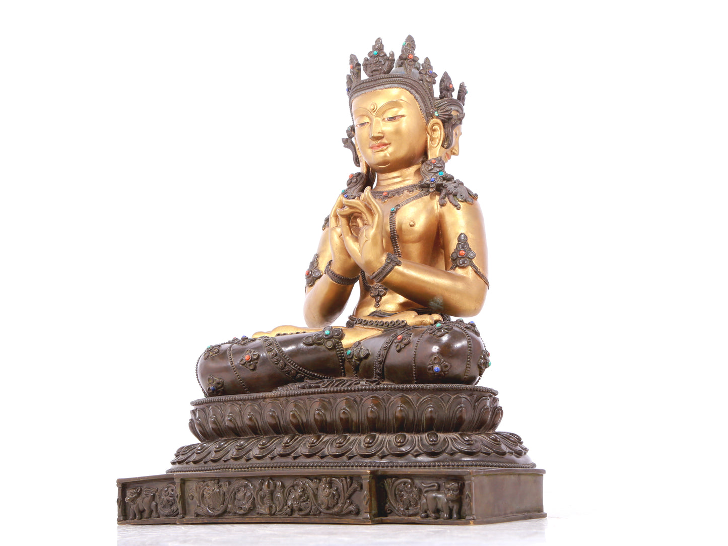 A serene gilt bronze statue of Bodhisattva inlaid with hundreds of treasures