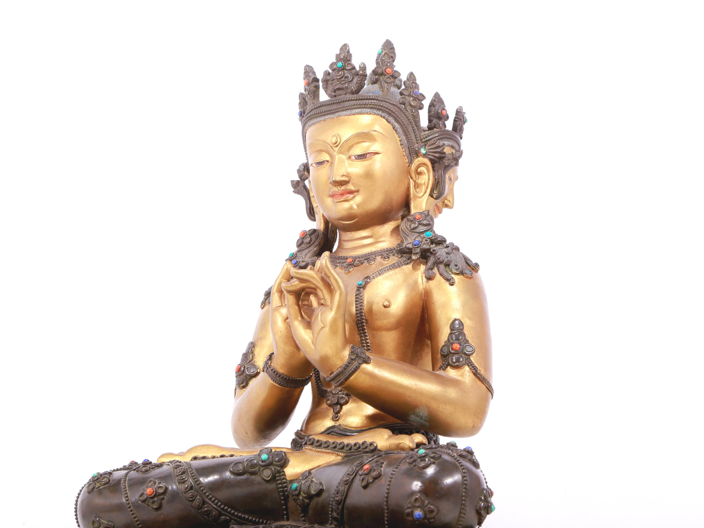 A serene gilt bronze statue of Bodhisattva inlaid with hundreds of treasures