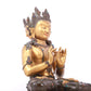 A serene gilt bronze statue of Bodhisattva inlaid with hundreds of treasures