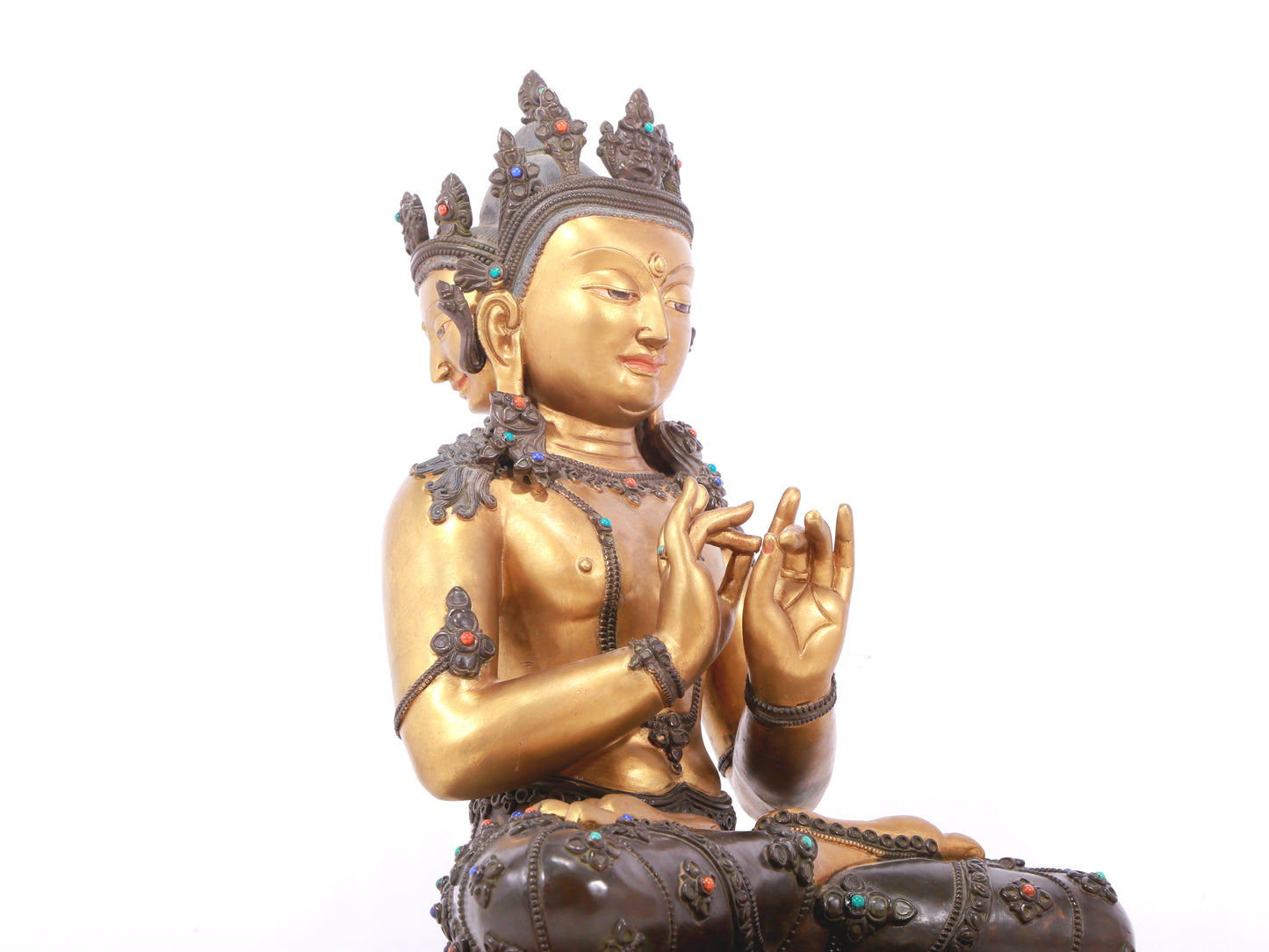 A serene gilt bronze statue of Bodhisattva inlaid with hundreds of treasures