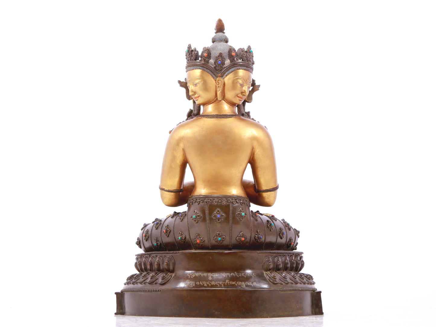 A serene gilt bronze statue of Bodhisattva inlaid with hundreds of treasures