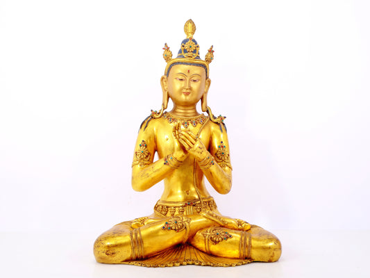 A serene gilt bronze statue of Bodhisattva inlaid with hundreds of treasures