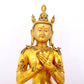 A serene gilt bronze statue of Bodhisattva inlaid with hundreds of treasures