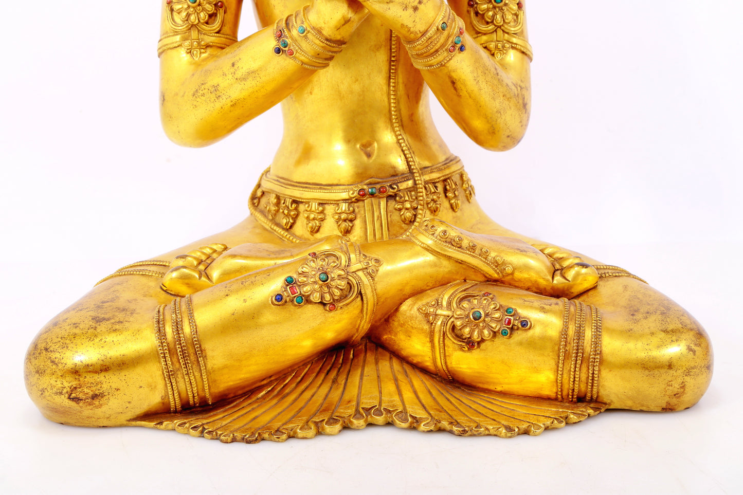 A serene gilt bronze statue of Bodhisattva inlaid with hundreds of treasures