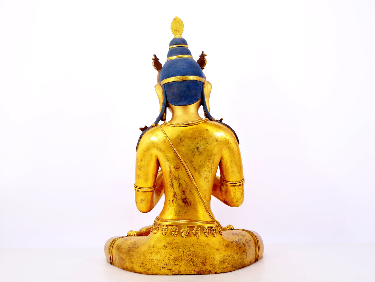 A serene gilt bronze statue of Bodhisattva inlaid with hundreds of treasures