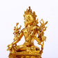 A serene gilt bronze green Tara statue