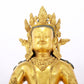 A serene gilt bronze statue of Amitayus Buddha