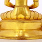 A serene gilt bronze statue of Amitayus Buddha