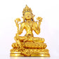 A serene gilt bronze statue of Tara inlaid with sapphire green