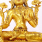 A serene gilt bronze statue of Tara inlaid with sapphire green