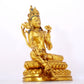 A serene gilt bronze statue of Tara inlaid with sapphire green