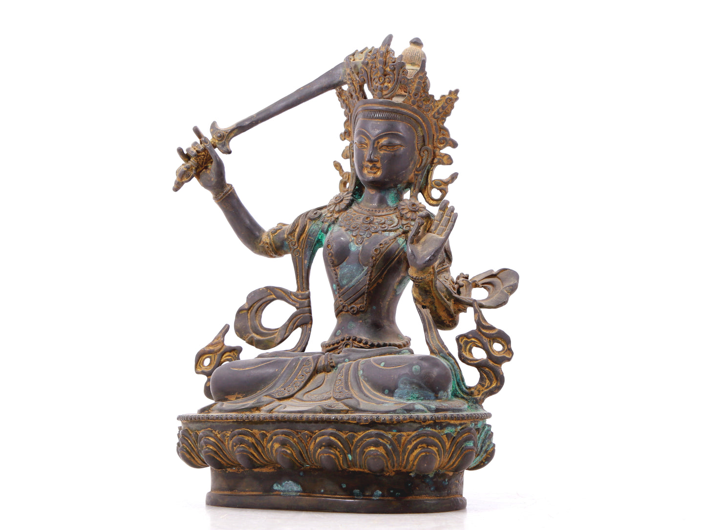 A serene gilt bronze statue of Manjushri Bodhisattva