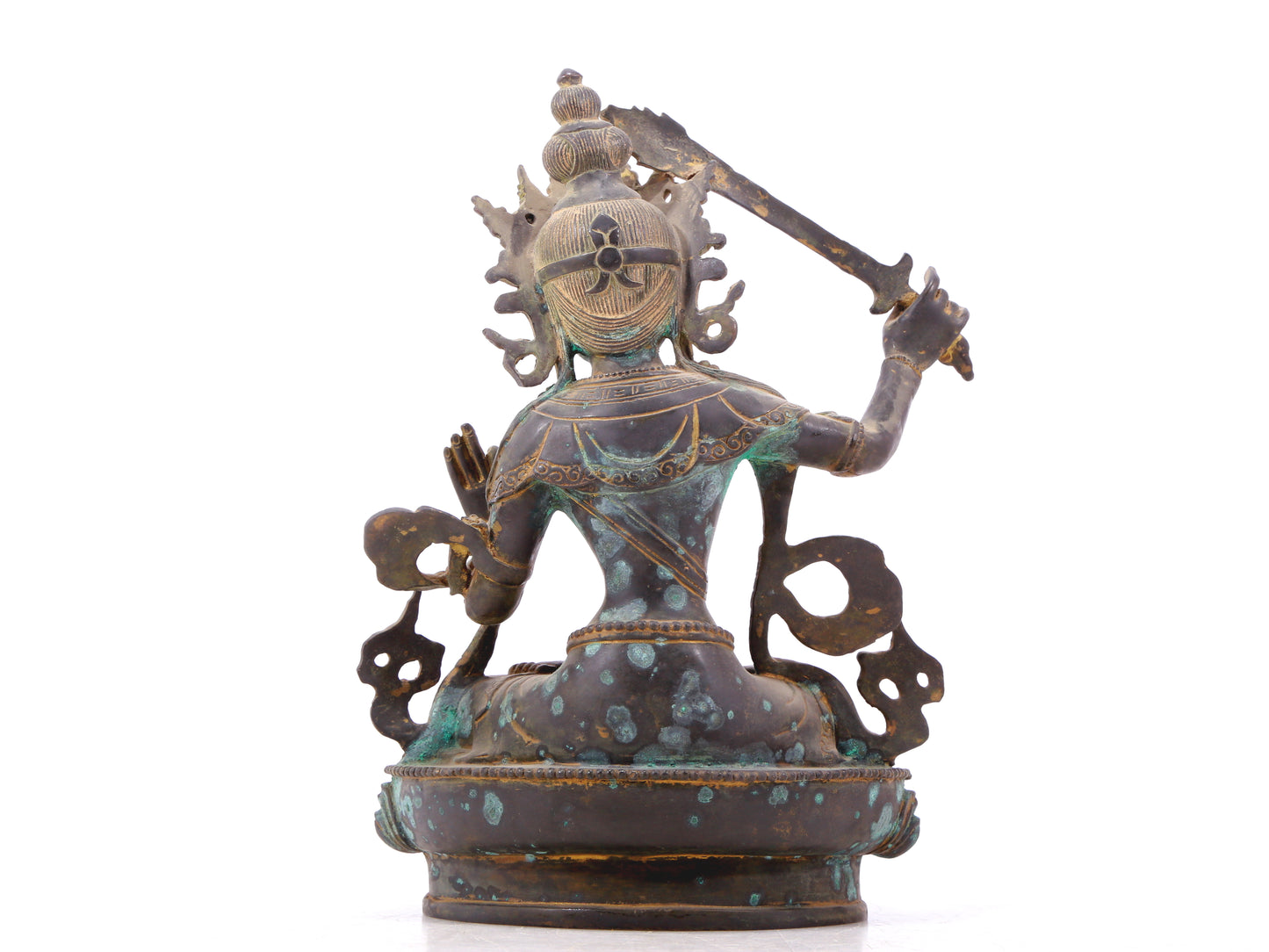 A serene gilt bronze statue of Manjushri Bodhisattva