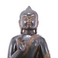 A serene gilt bronze statue of Gautama Buddha