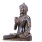 A serene gilt bronze statue of Gautama Buddha