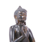 A serene gilt bronze statue of Gautama Buddha