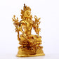 A serene gilt bronze green Tara statue