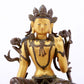 A serene gilt bronze green Tara statue