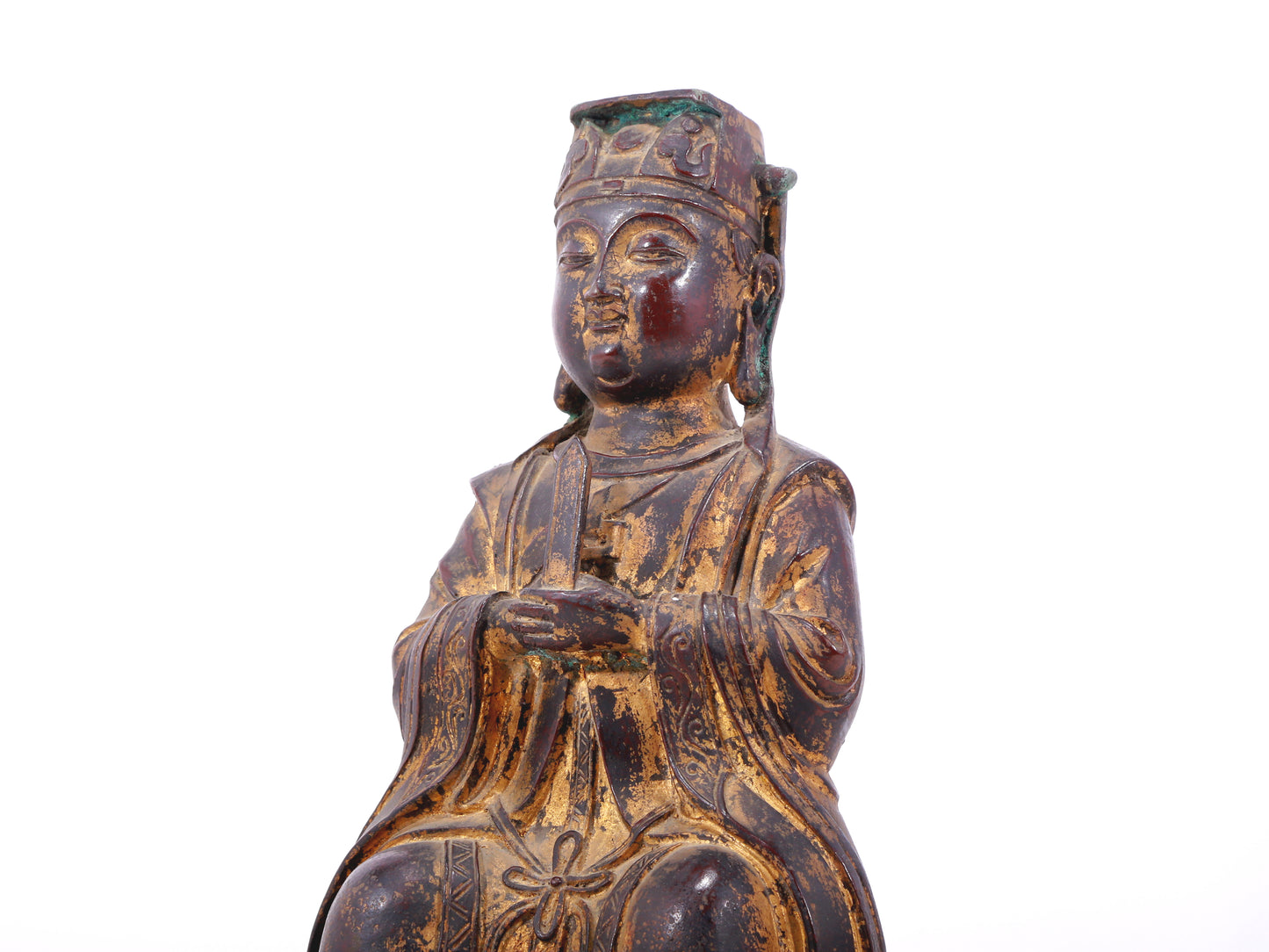 A serene gilt bronze statue of Wenquxing