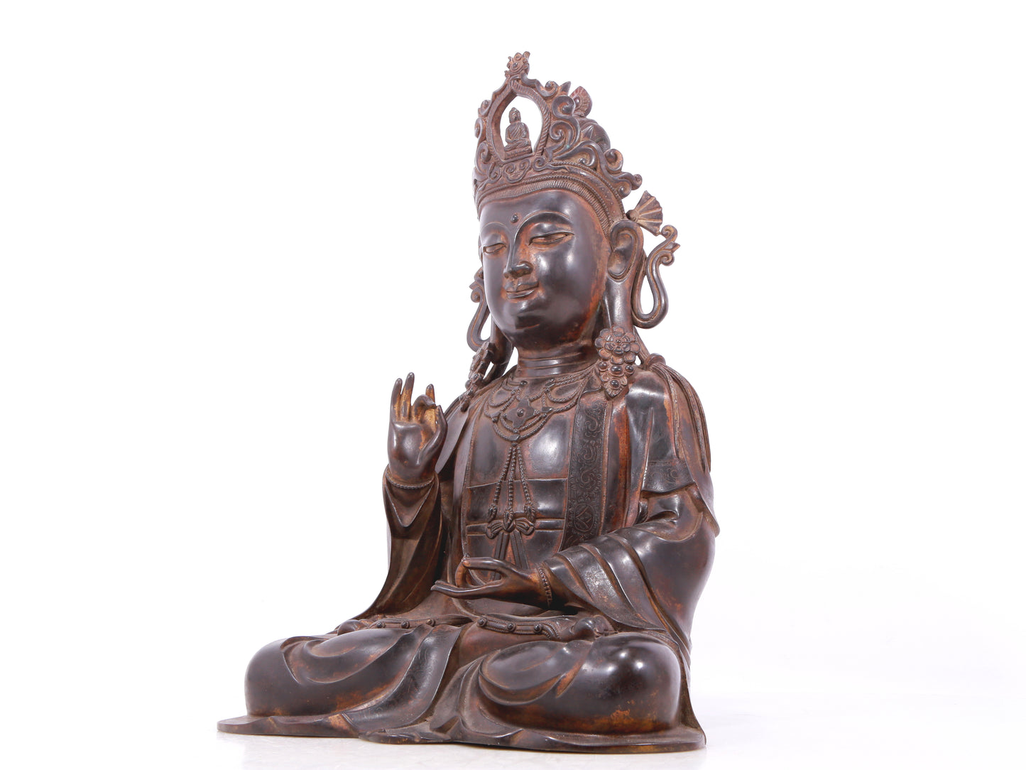 A serene gilt bronze Guanyin statue