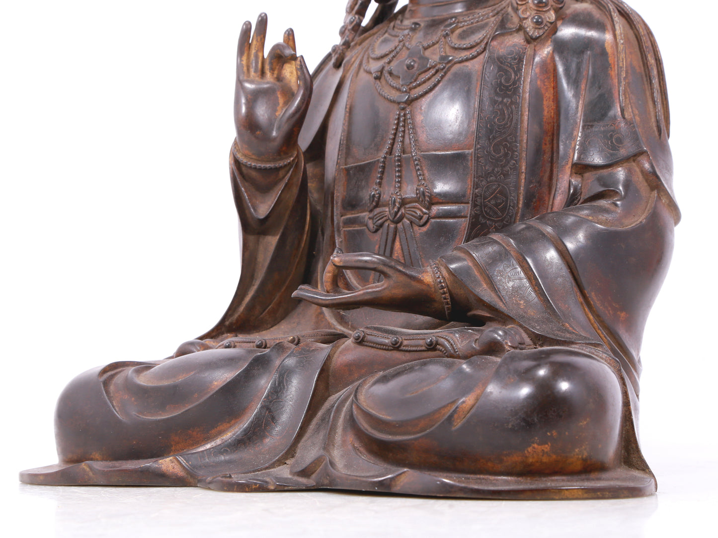 A serene gilt bronze Guanyin statue