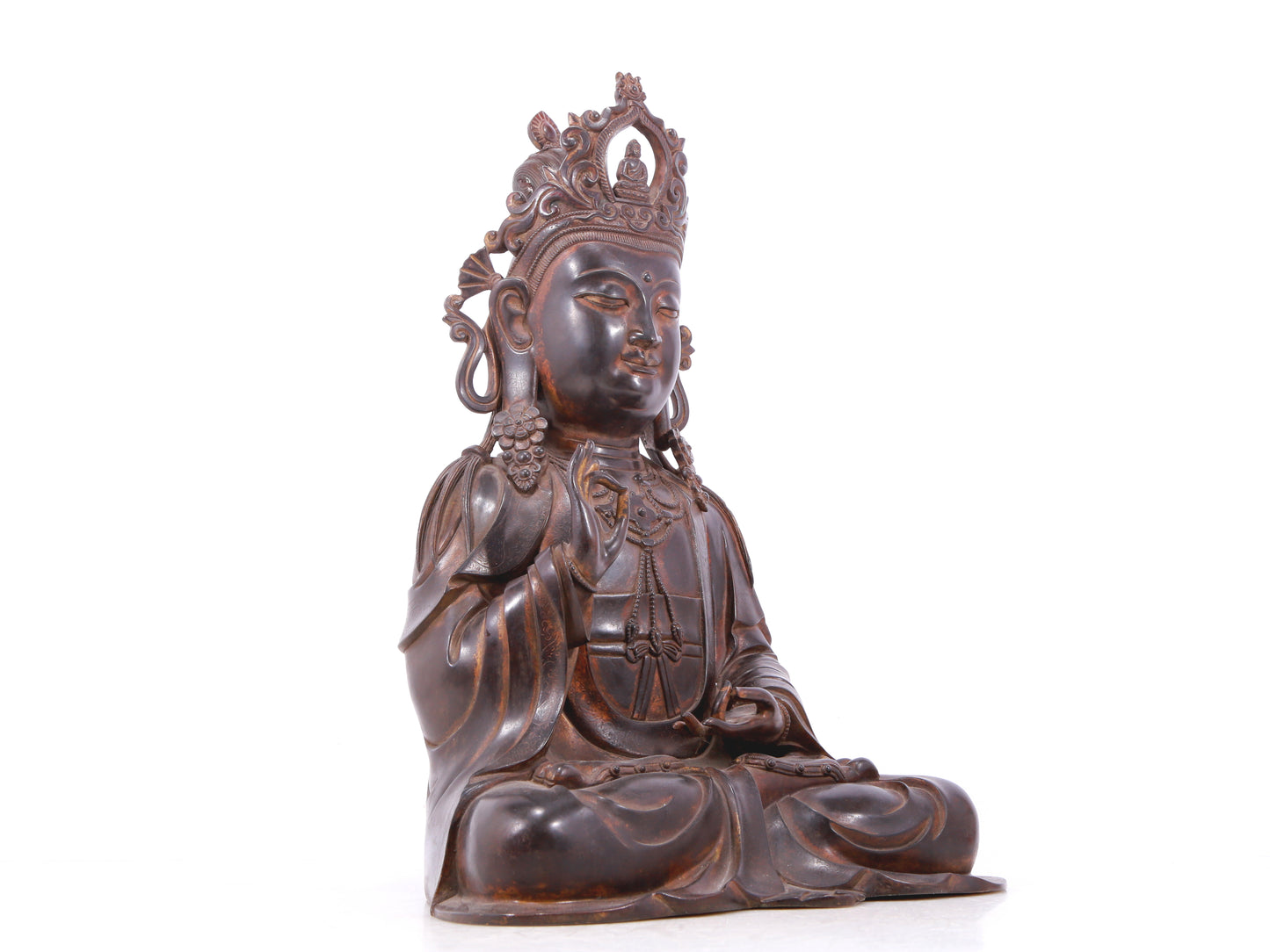 A serene gilt bronze Guanyin statue