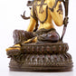 A serene gilt bronze green Tara statue