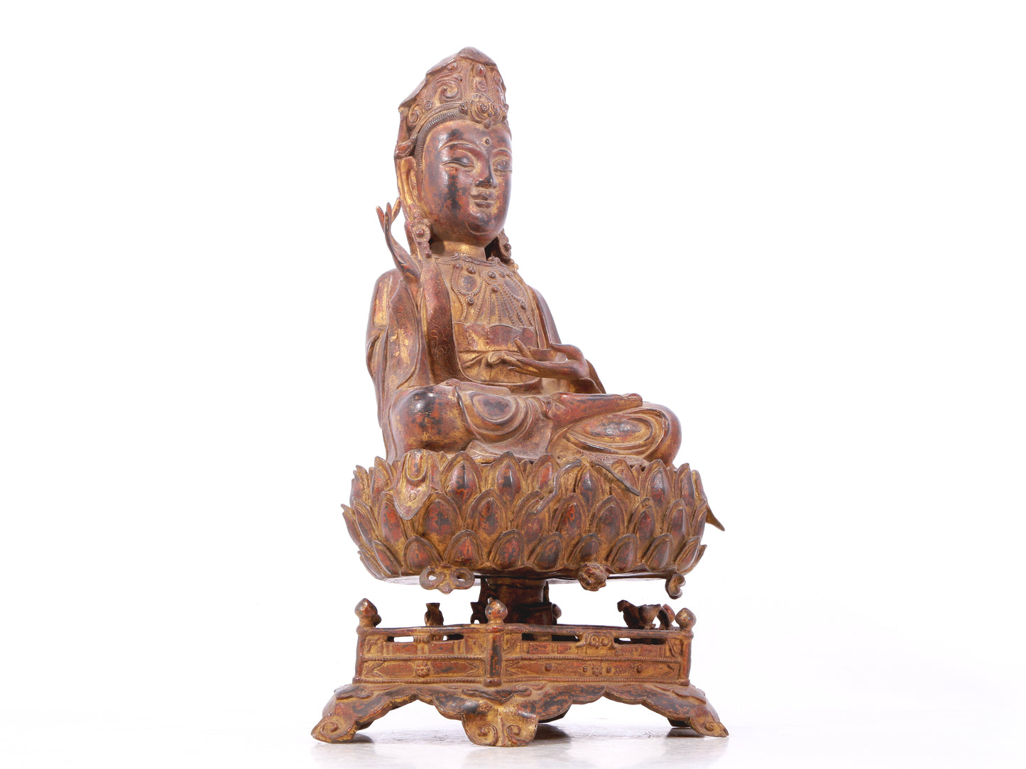 A serene gilt bronze Guanyin statue