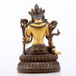 A serene gilt bronze green Tara statue