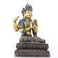 A serene gilt bronze four-armed Guanyin statue