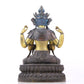 A serene gilt bronze four-armed Guanyin statue