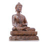 A serene gilt bronze statue of Gautama Buddha