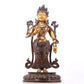 A serene gilt bronze statue of Tara