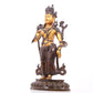 A serene gilt bronze statue of Tara