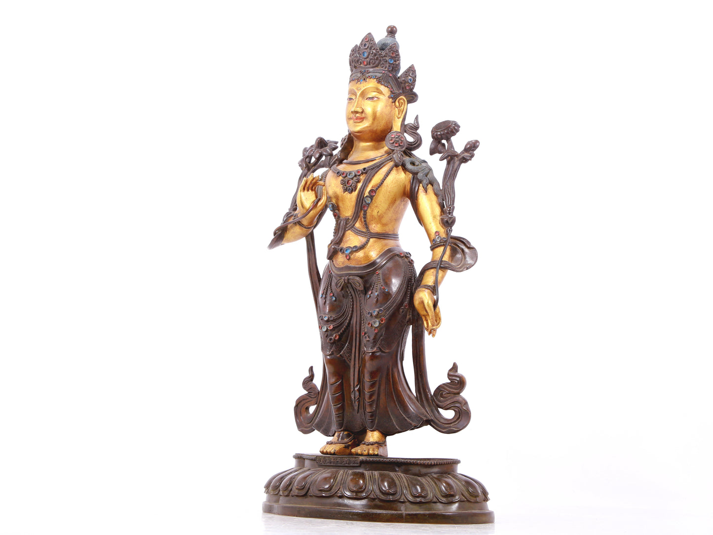 A serene gilt bronze statue of Tara