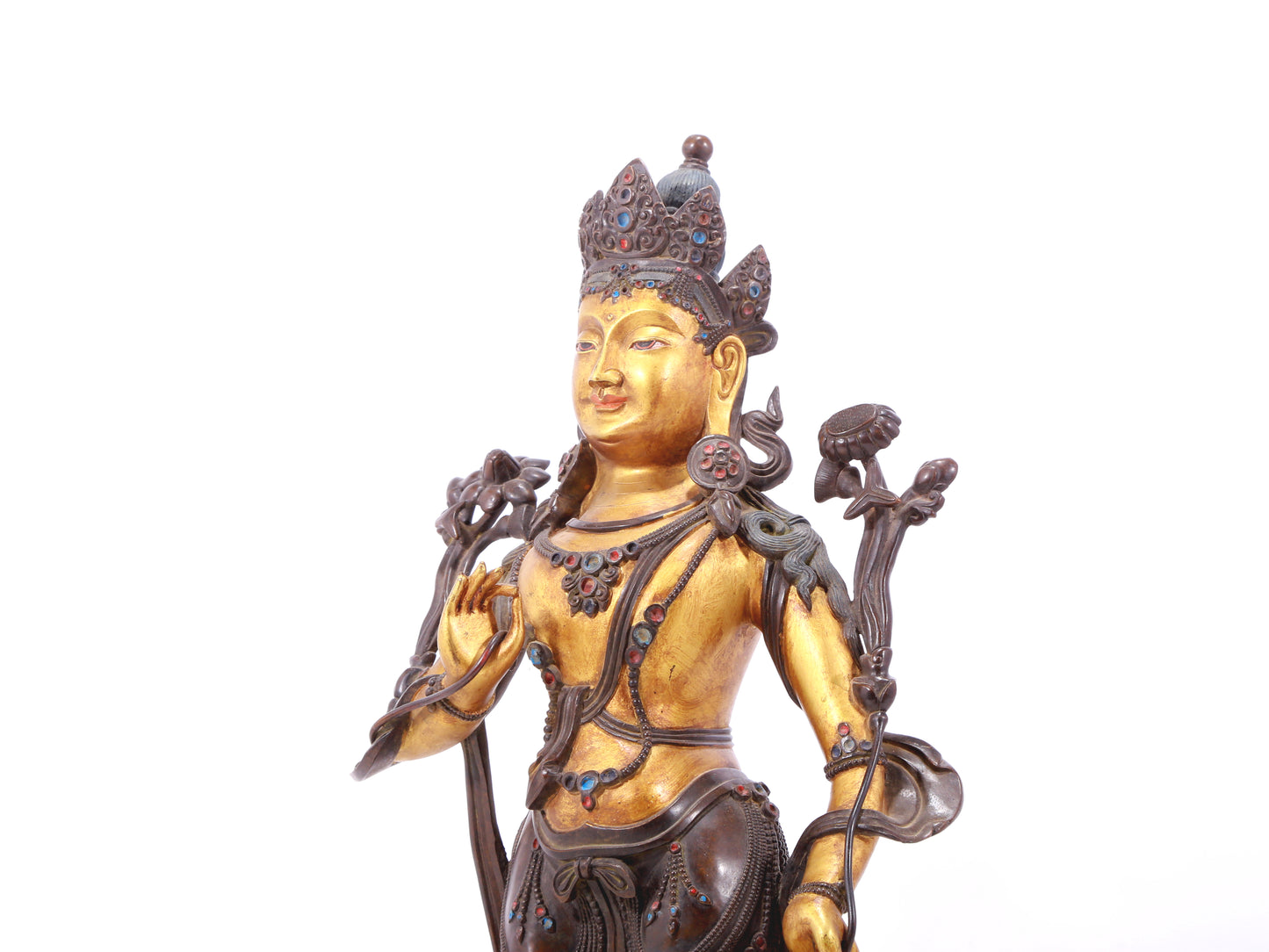 A serene gilt bronze statue of Tara