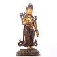 A serene gilt bronze statue of Tara