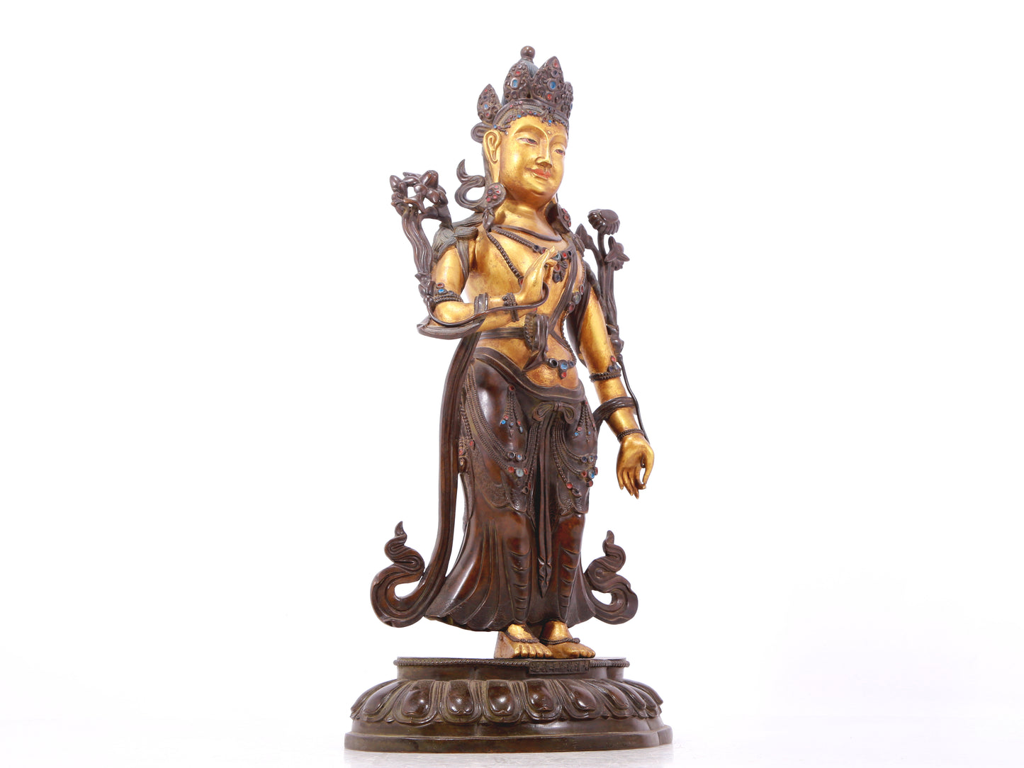 A serene gilt bronze statue of Tara