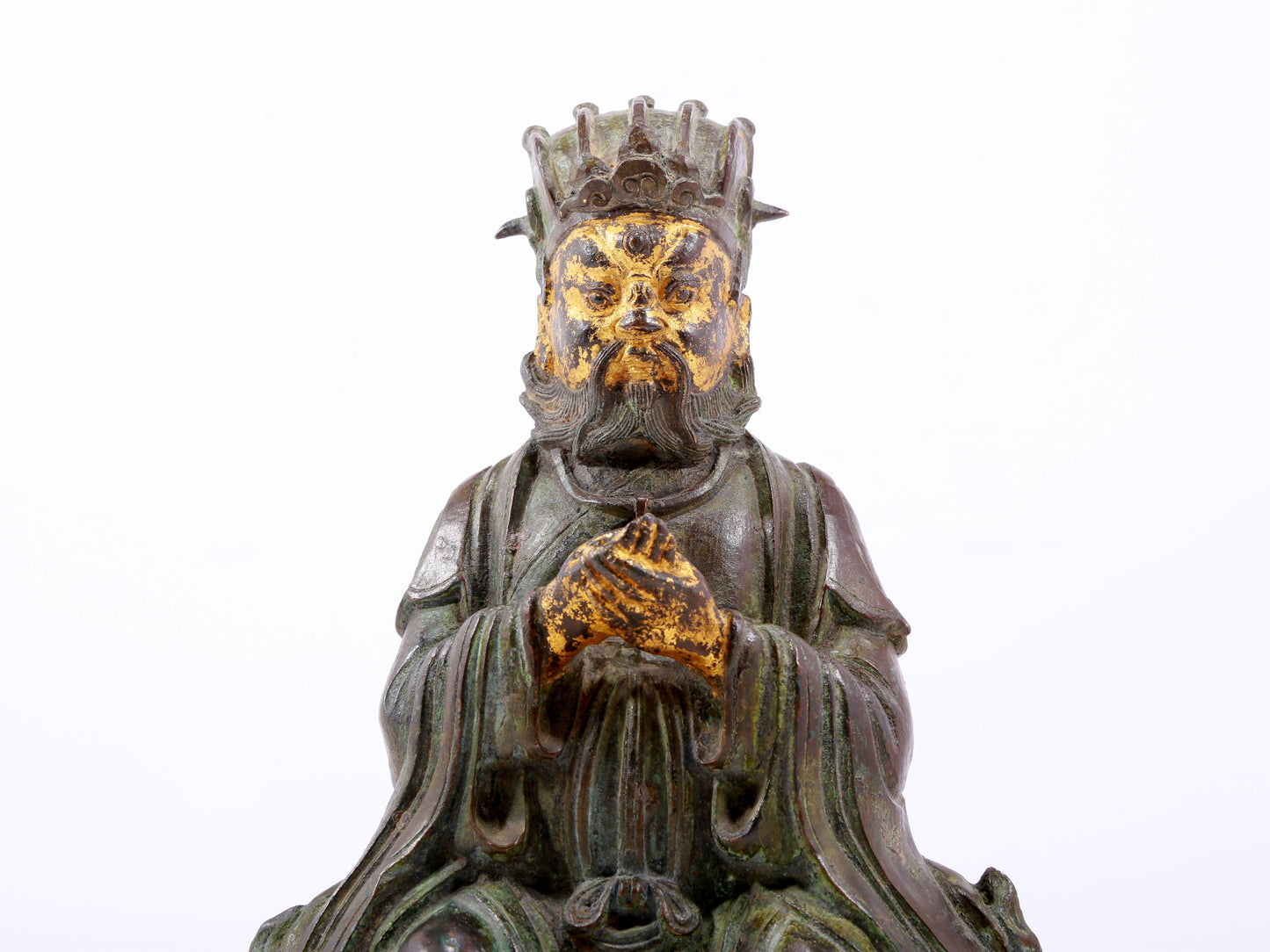 A serene gilt bronze figure