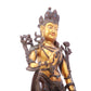 A serene gilt bronze statue of Tara