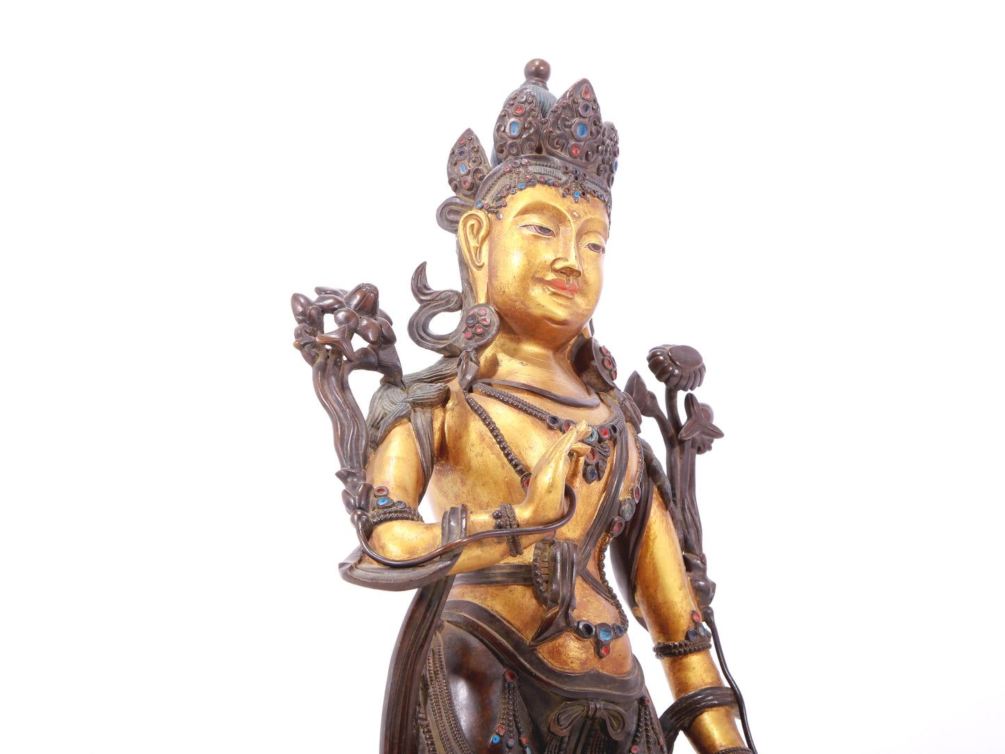 A serene gilt bronze statue of Tara