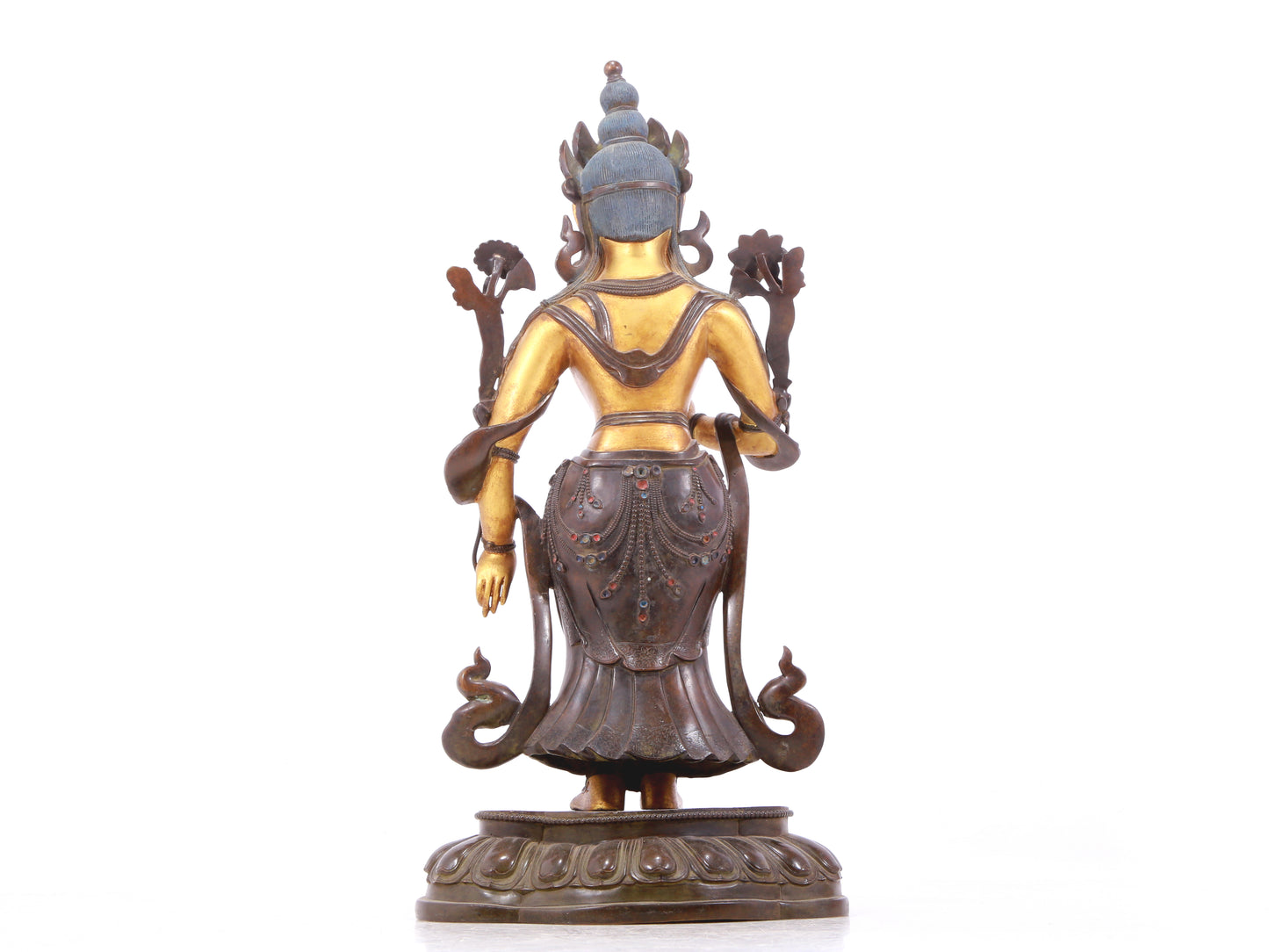 A serene gilt bronze statue of Tara