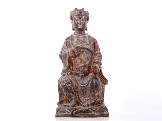 A serene gilt bronze statue of God of Wealth