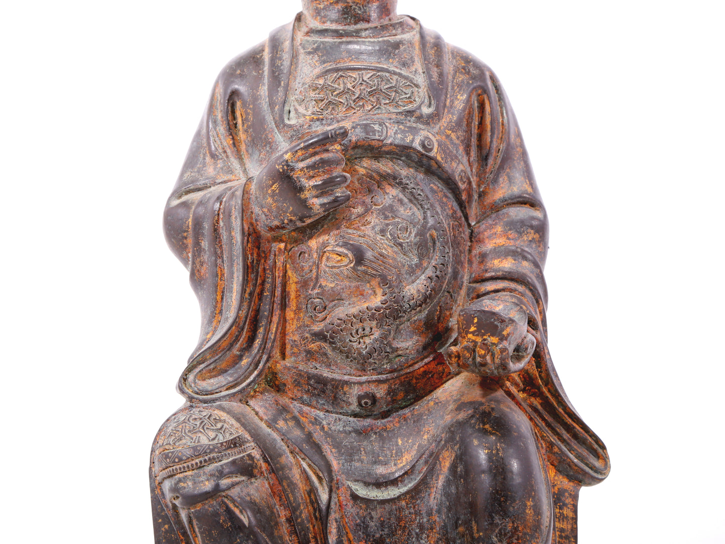 A serene gilt bronze statue of God of Wealth