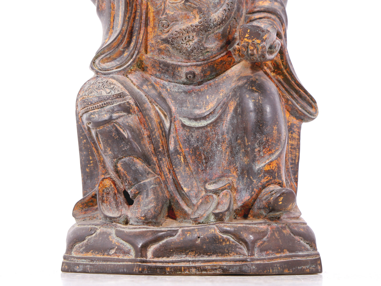 A serene gilt bronze statue of God of Wealth