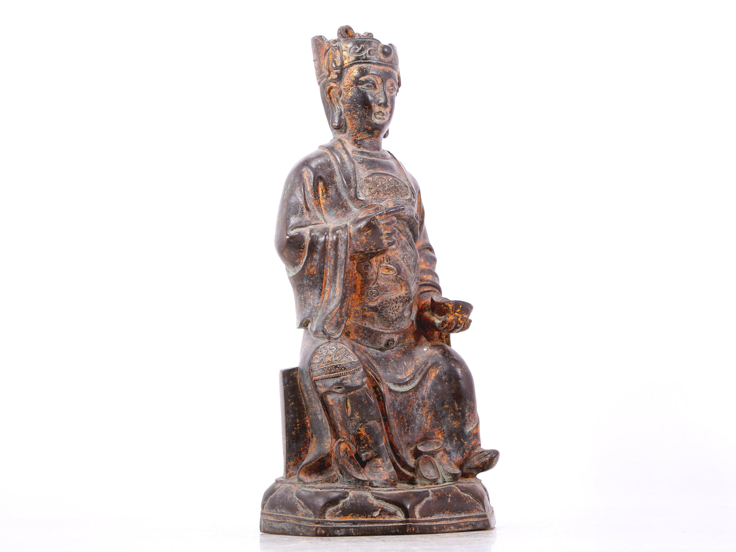 A serene gilt bronze statue of God of Wealth