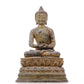 A serene gilt bronze statue of Gautama Buddha